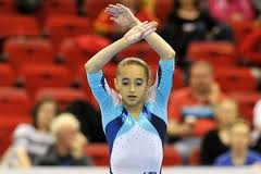 Aur la bârnă şi sol, argint la sărituri şi paralele, pentru Larisa Iordache